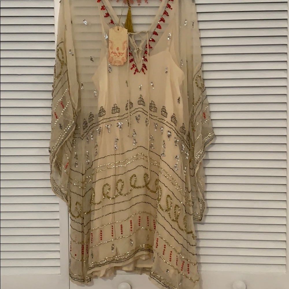 Beautiful beaded dress full slip attached